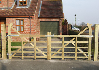 Image showing double wooden gates on a driveway